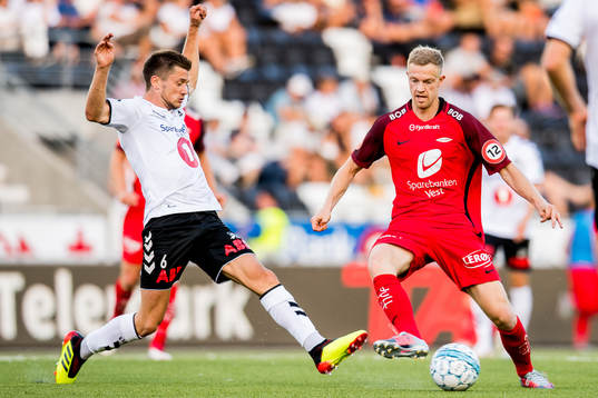 Vebjørn Alvestad Hoff of Odd and Peter Orry Larsen of Brann