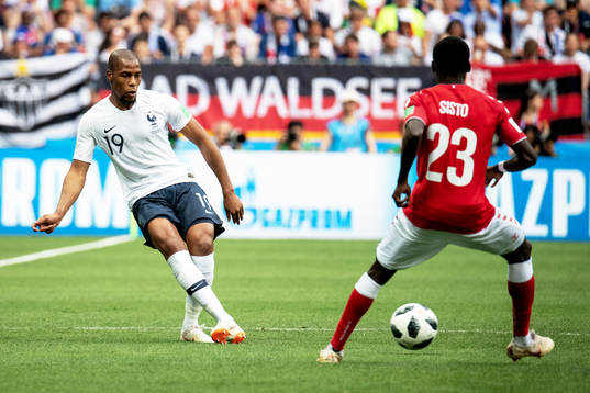 Ngolo Kante of France and Pione Sisto of Denmark