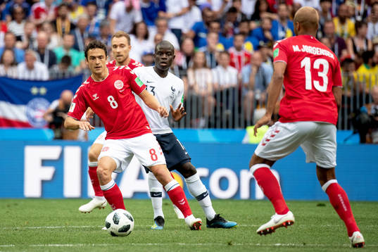 Thomas Delaney of Denmark and Ngolo Kante of France