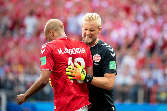Mathias Jørgensen and goalkeeper Kasper Schmeichel of