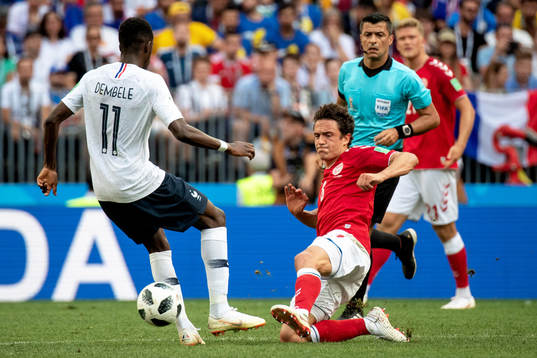 Ousmane Dembele of France and Thomas Delaney of Denmark
