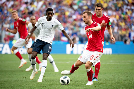 Ousmane Dembele of France and Christian Eriksen of Denmark