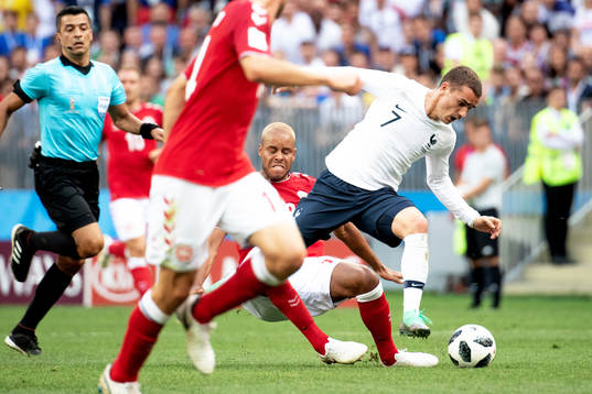 Mathias Jørgensen of Denmark and Antoine Griezmann of