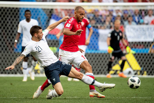 Lucas Hernandez of France and Martin Braithwaite of Denmark