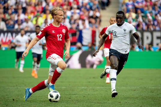 Kasper Dolberg of Denmark and Benjamin Mendy of France