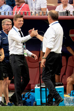coach Jon Dahl Tomasson and head coach Åge Hareide of