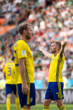 Ola Toivonen and Sebastian Larsson of Sweden looks dejected