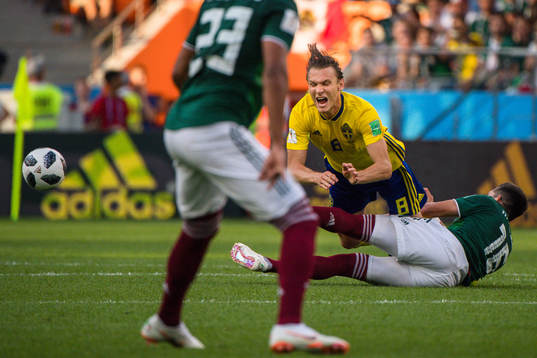 Albin Ekdal of Sweden against Hector Herrera of Mexico