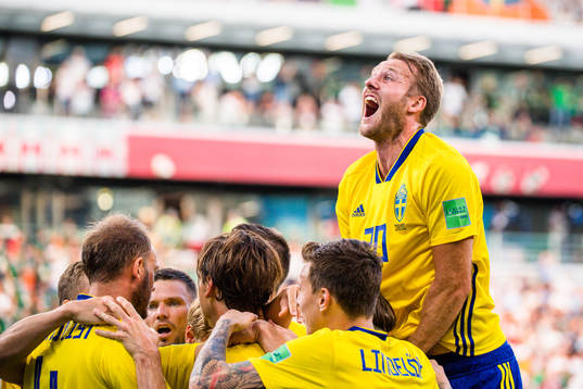 Ola Toivonen celebrates with Andreas Granqvist of Sweden