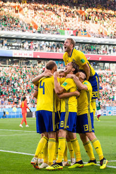 Ola Toivonen celebrates with Andreas Granqvist of Sweden