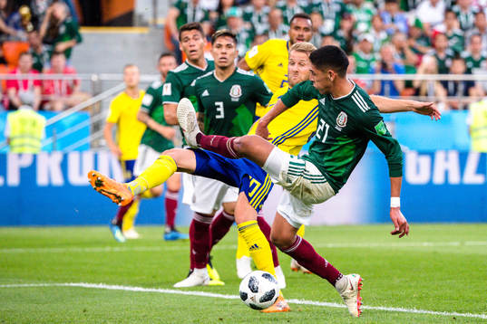 Ola Toivonen of Sweden scores the 0-3 goal via Edson