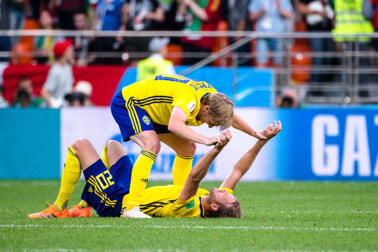 Emil Forsberg and Ola Toivonen of Sweden celebrates