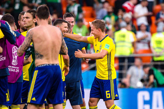 Marcus Berg and Ludwig Augustinsson of Sweden celebrates