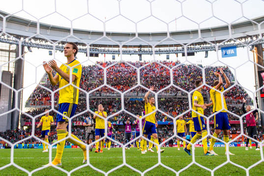 Players of Sweden celebrates