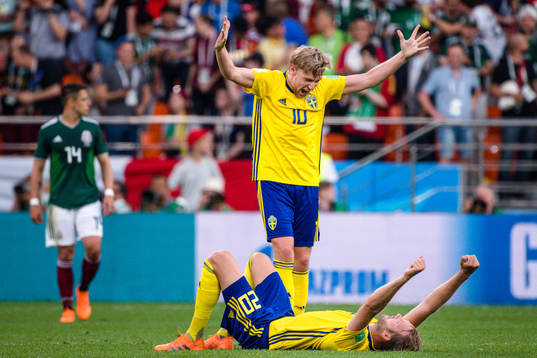 Emil Forsberg and Ola Toivonen of Sweden celebrates