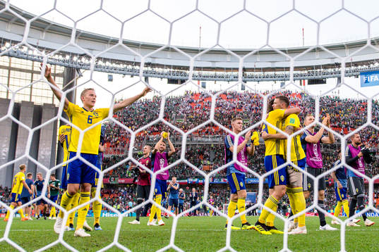 Players of Sweden celebrates
