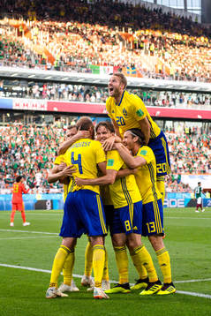 Ola Toivonen of Sweden celebrates the his teammates
