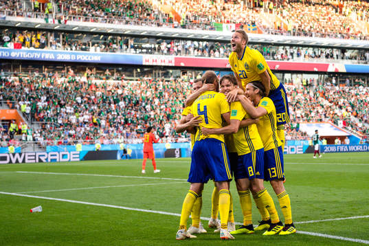 Ola Toivonen of Sweden celebrates the his teammates