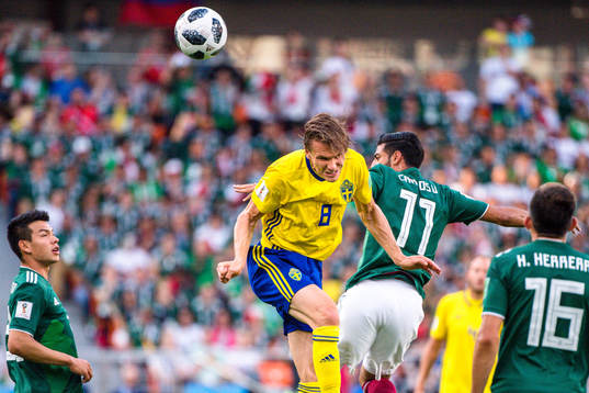 Albin Ekdal of Sweden and Carlos Vela  of Mexico