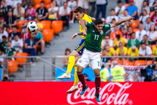 Victor Nilsson Lindelöf of Sweden and Carlos Vela  of
