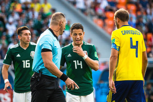 Referee Nestor Pitana, Javier Hernandez  of Mexico and