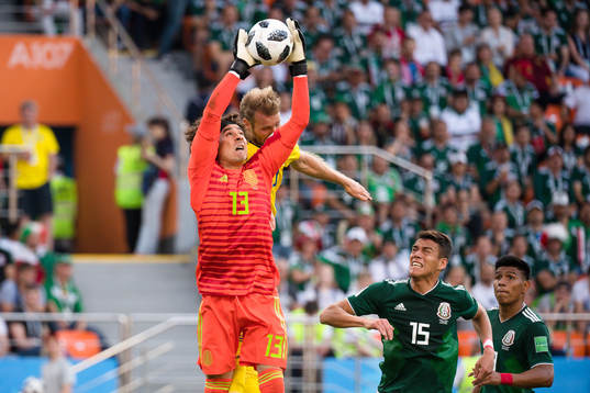 Ola Toivonen of Sweden against goalkeeper Guillermo Ochoa