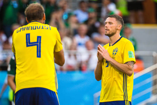 Andreas Granqvist and Marcus Berg of Sweden looks dejected