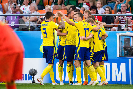Players of Sweden celebrates