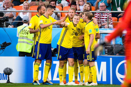 Players of Sweden celebrates
