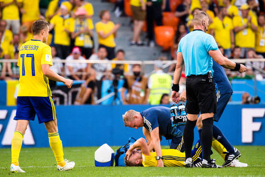 Sebastian Larsson of Sweden with a injury