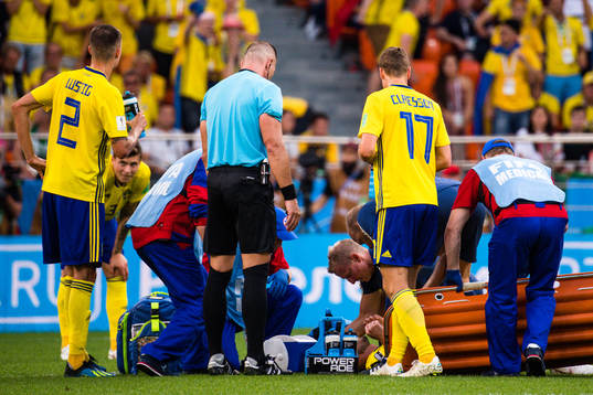 Sebastian Larsson of Sweden with a injury