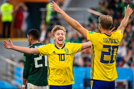 Emil Forsberg and Ola Toivonen of Sweden celebrates the 0-3
