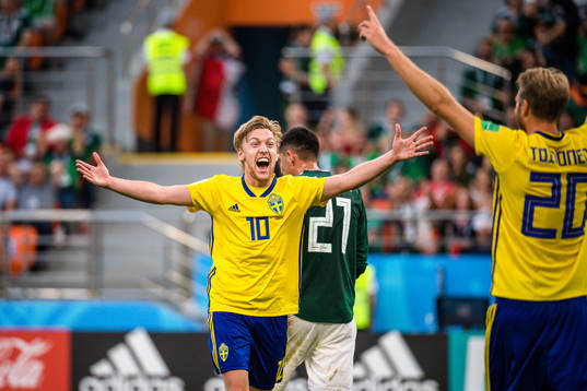 Emil Forsberg and Ola Toivonen of Sweden celebrates the 0-3