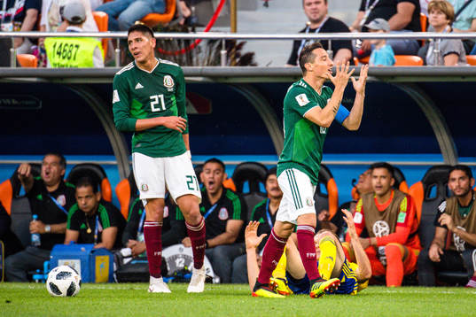 Edson Alvarez and Andres Guardado of Mexico looks dejected