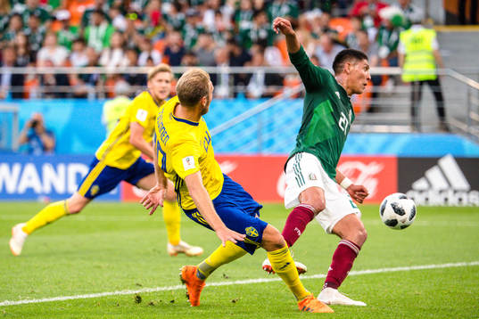 Ola Toivonen of Sweden scores the 0-3 goal via Edson