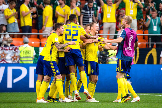 Players of Sweden celebrates