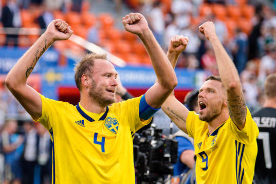 Andreas Granqvist and Marcus Berg of Sweden celebrates