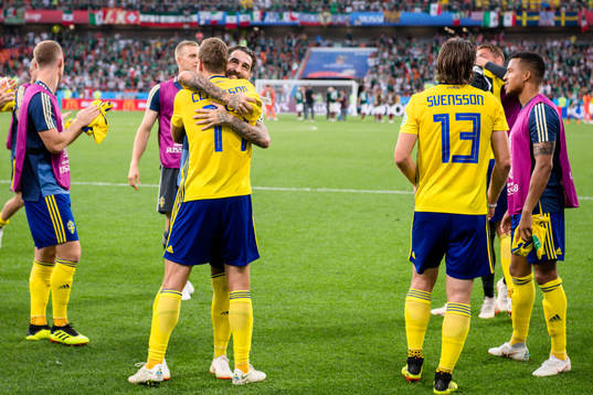 Viktor Claesson and Jimmy Durmaz of Sweden celebrates