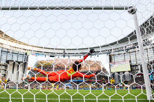 Andreas Granqvist of Sweden scores 0-2 from the penalty