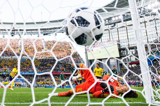 Andreas Granqvist of Sweden scores 0-2 from the penalty