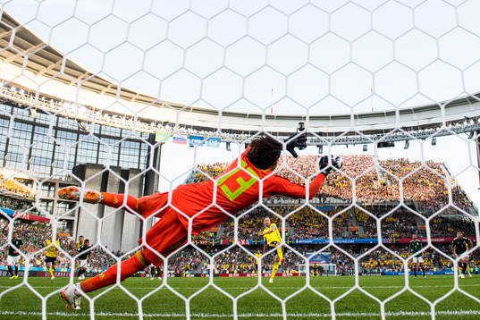 Andreas Granqvist of Sweden scores 0-2 from the penalty