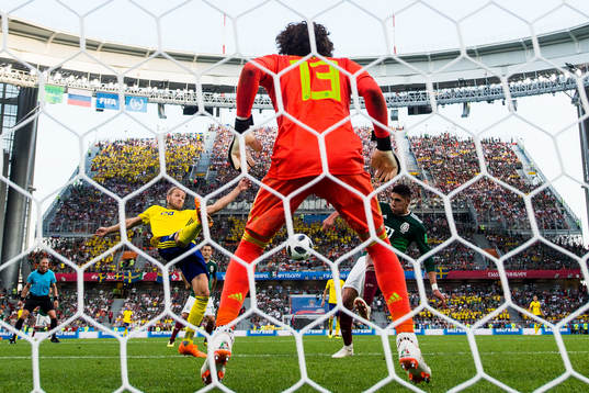 Ola Toivonen of Sweden scores 0-3 behind goalkeeper