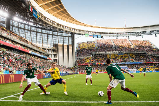 Viktor Claesson of Sweden in action with Hector Herrera and