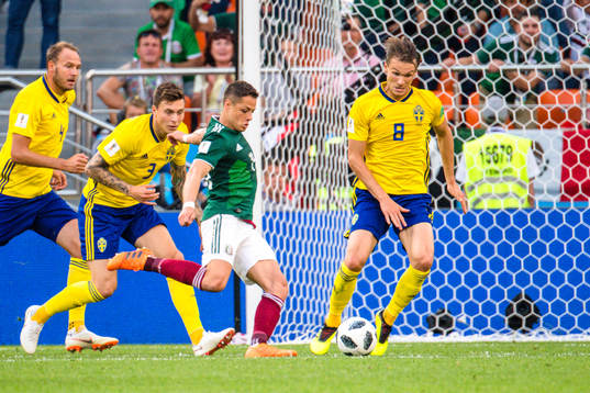 Javier Hernandez  of Mexico  against Andreas Granqvist,