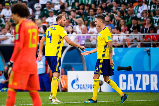 Andreas Granqvist and Mikael Lustig of Sweden celebrates