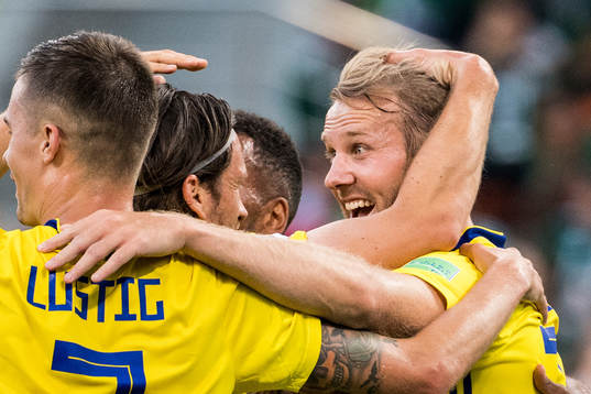 Ola Toivonen of Sweden celebrates with team mates