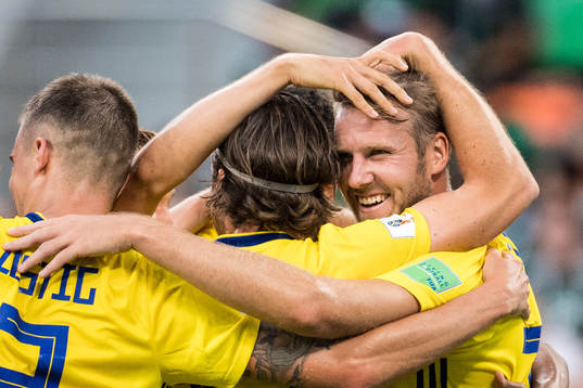Ola Toivonen of Sweden celebrates with team mates
