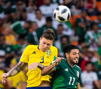 Victor Nilsson Lindelöf of Sweden and Carlos Vela of Mexico