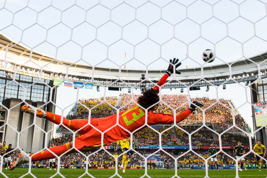 Andreas Granqvist of Sweden scores 0-2 from the penalty