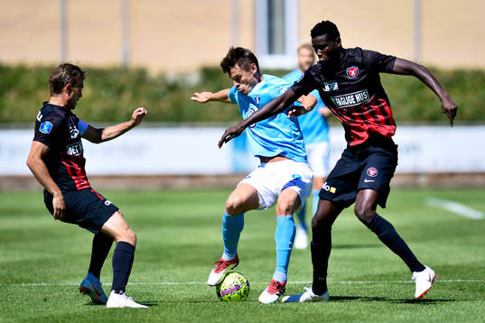 Malmö FFs Markus Rosenberg och Midtjyllands Jakob Poulsen
